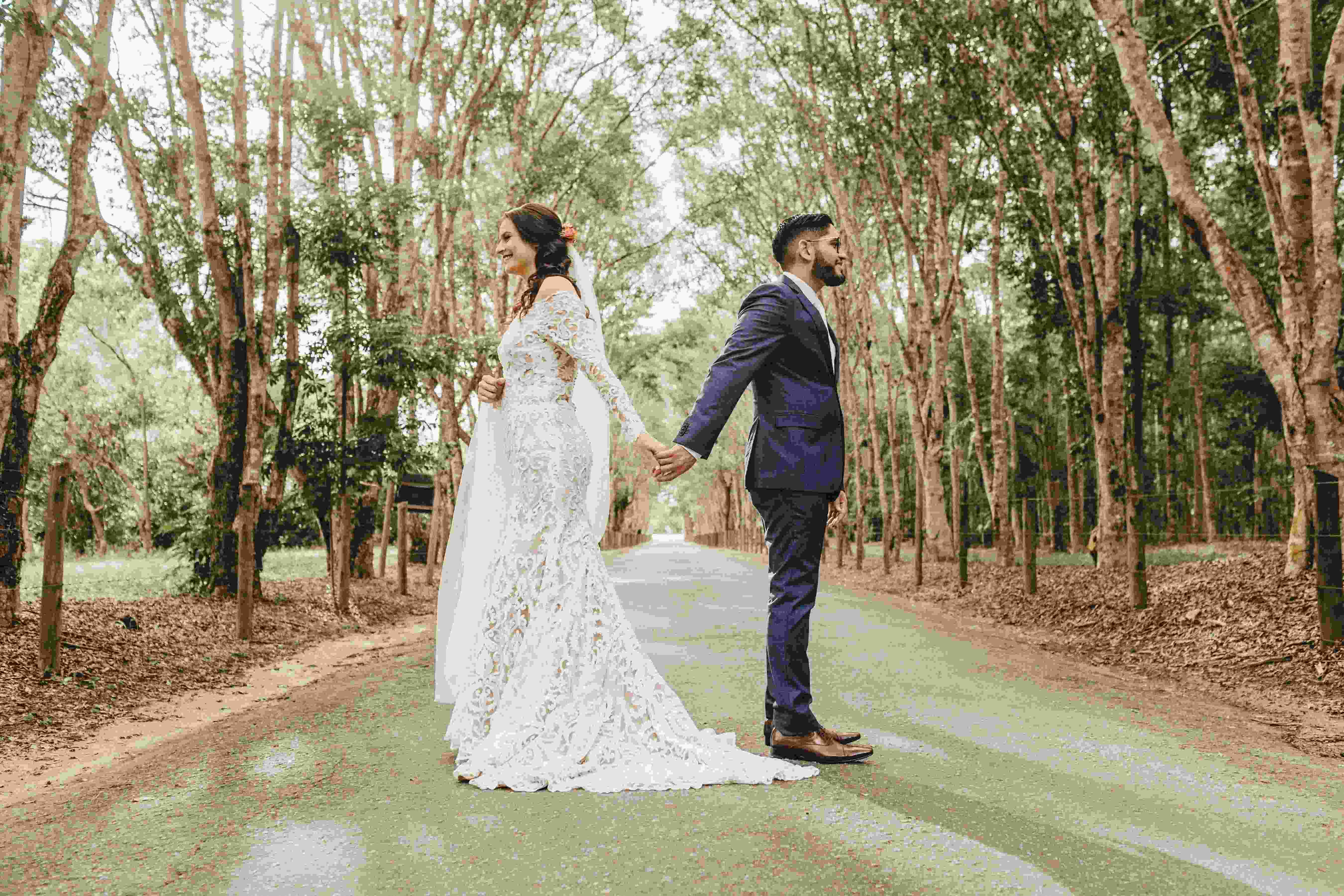 Bride and Groom Holding Hands